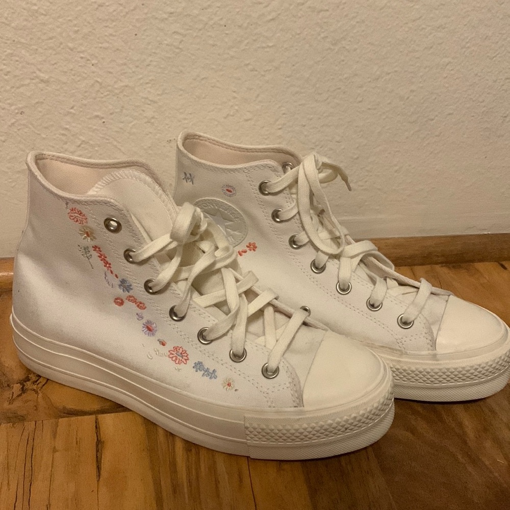 platform white converse with embroidered flowers